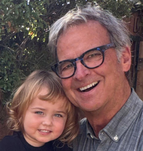 Photo of Paddy Morrisey with grandchild